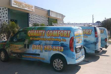 Quality Comfort Air Conditioning and Heating Inc. work trucks