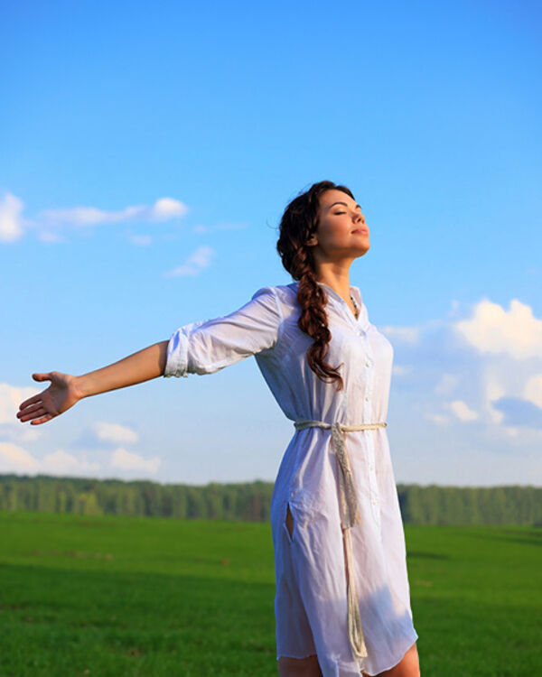 Woman standing outdoors breathing fresh air in Melbourne, Florid